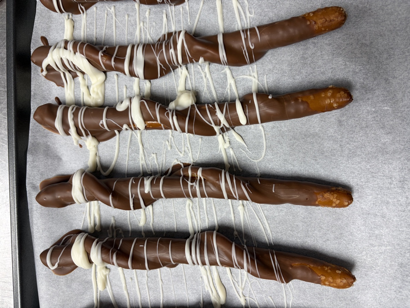 Caramel Pretzel Wands dipped in chocolate and decorated